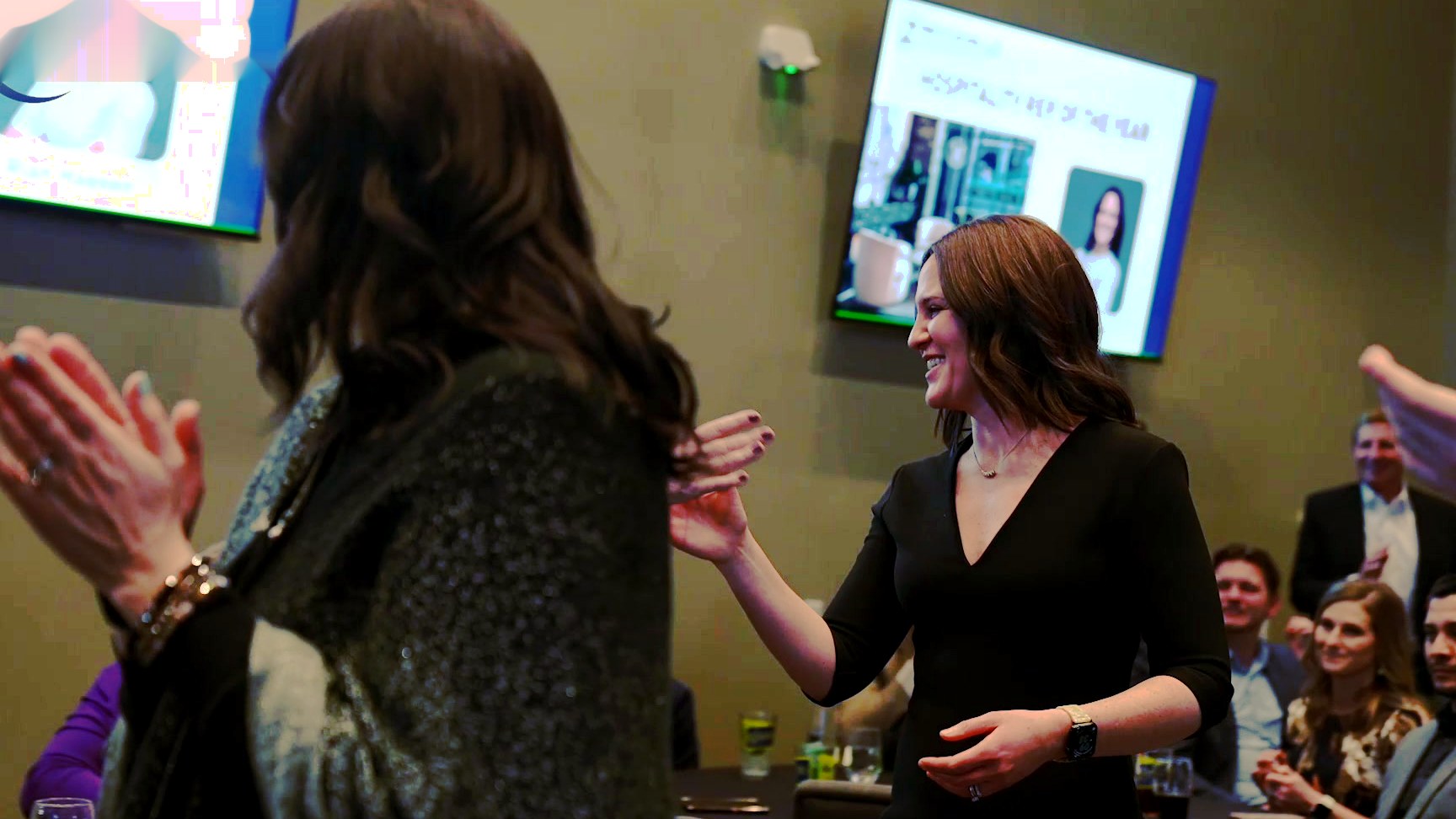 Members networking at the Taphouse bar