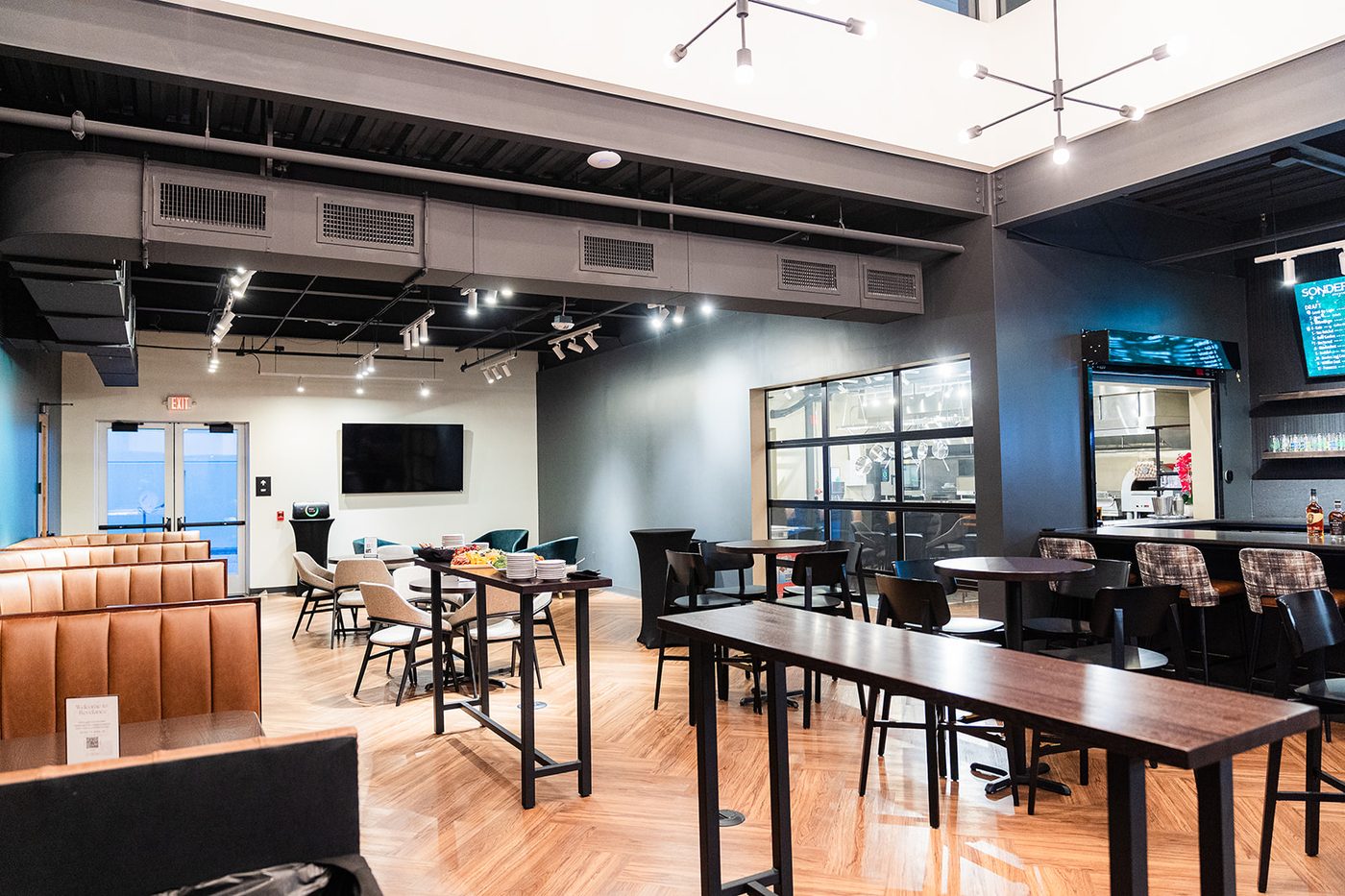 The Taphouse at Revelance — full room view with bar seating and lounge area